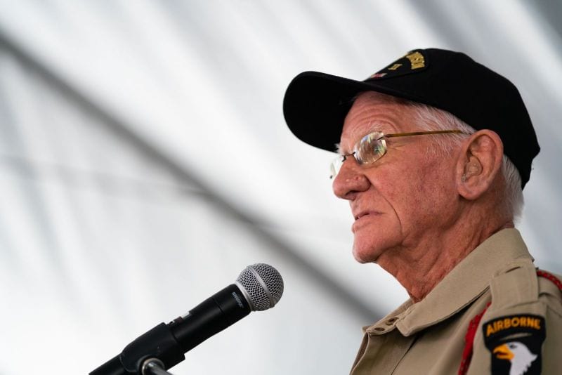 Tom Rice, an Army 101st Airborne paratrooper who jumped into Normandy as part of Operation Overlord on June 6, 1944, speaks during the centennial celebration. (Photo by Lucas Carter/The American Legion)