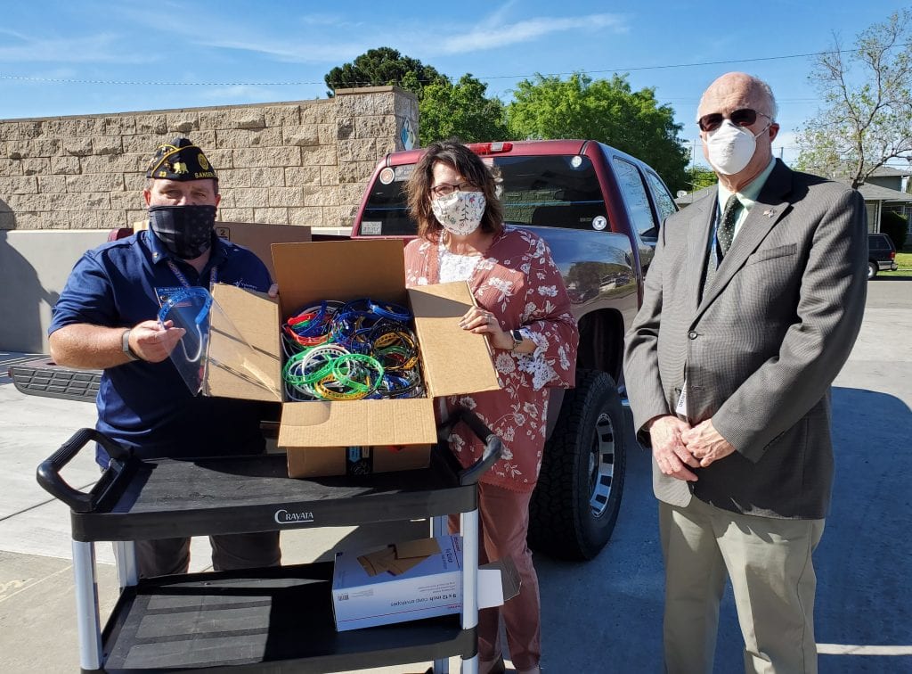 American Legion - Post 23 Commander, James Bennett delivers 3D-printed face shields. Pictured from left to right: James Bennett, Mary Golden and Charles Benninger.