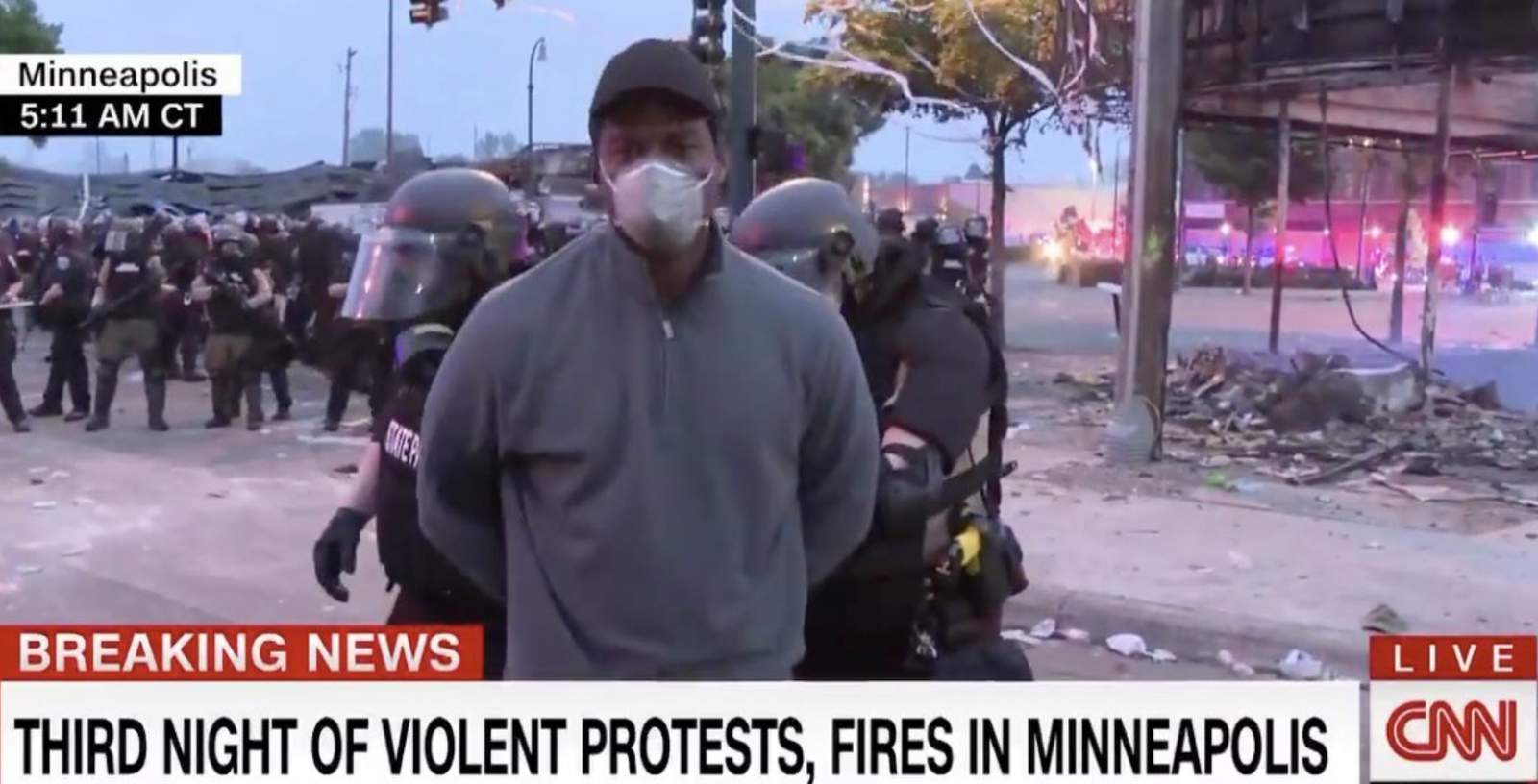 Army veteran and CNN photojournalist arrested while covering riots