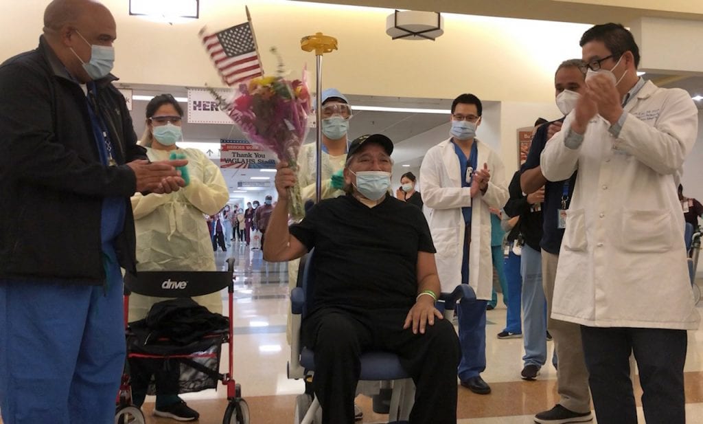 Jerry Salas, 68-year-old Army Veteran, receives a congratulatory sendoff from his healthcare providers as he is discharged from the main hospital at VA Greater Los Angeles Healthcare System’s West Los Angeles campus, on May 15, 2020. Salas was admitted to the VAGLAHS’ hospital on March 29, 2020 after contracting the Novel Coronavirus and falling severely ill.