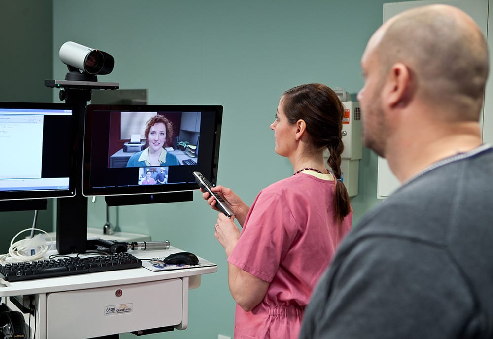 nurse and patient doing a telehealth visit