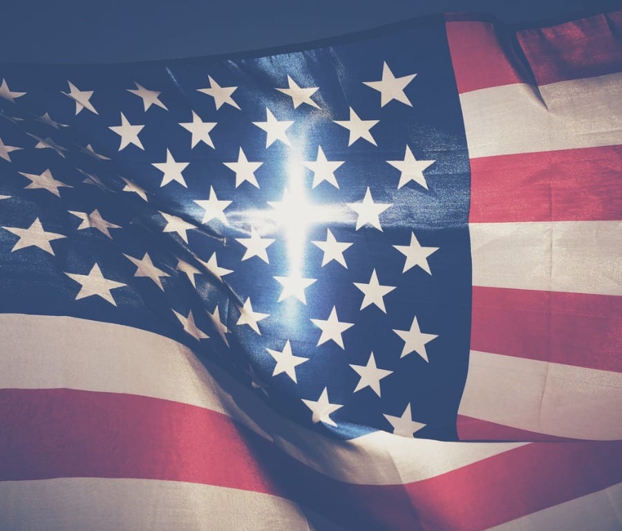 american flag with radiant cross