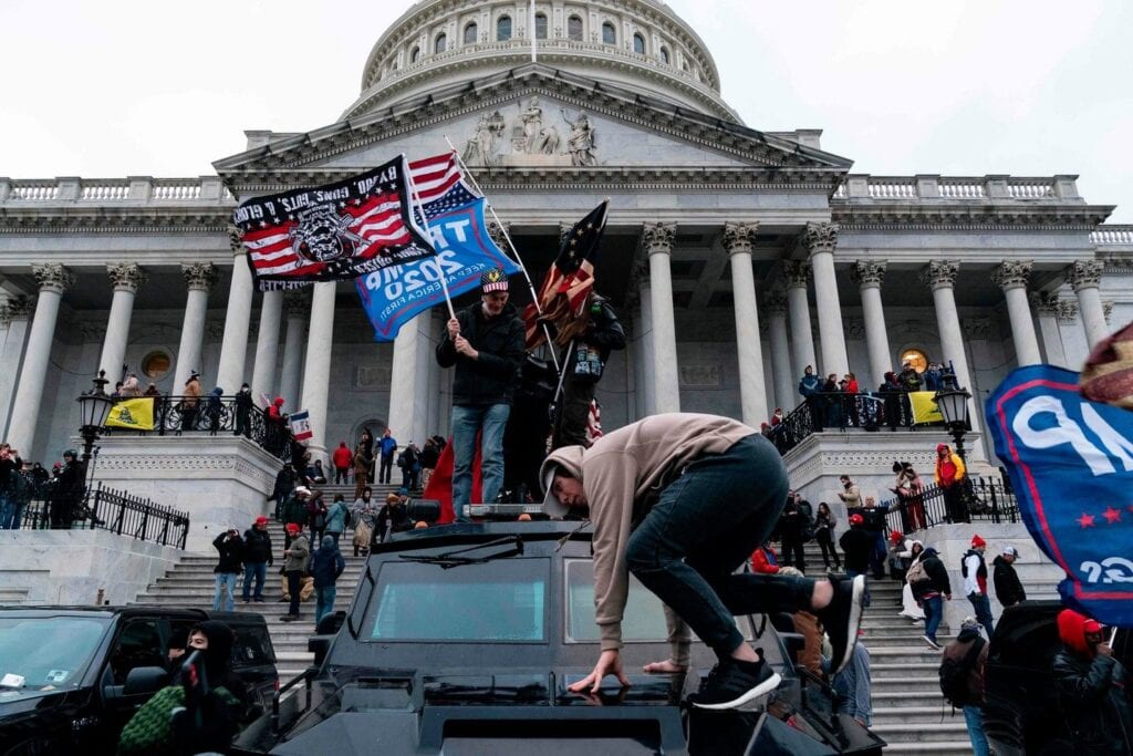 Supporters of US president Donald Trump protest outside the US Capitol. They later entered the Capitol as Congress debated the 2020 presidential election electoral vote certification. Photograph: ALEX EDELMAN/AFP via Getty Images