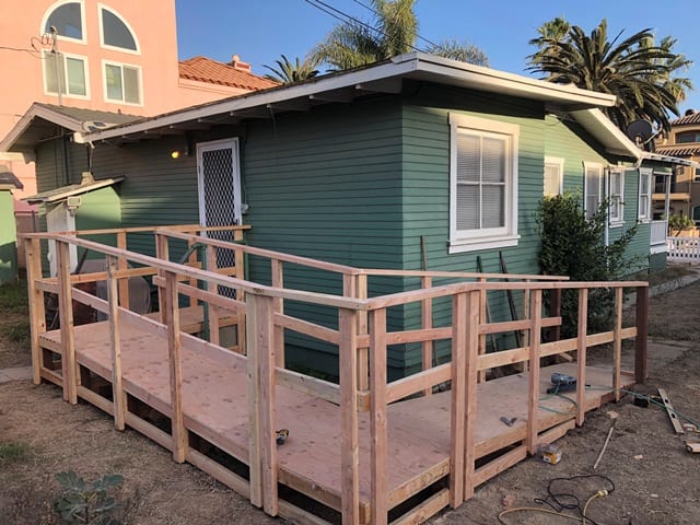 In this Dec. 8, 2020, photo, a ramp is being build for Huntington Beach resident and WWII veteran Russ Paxson.