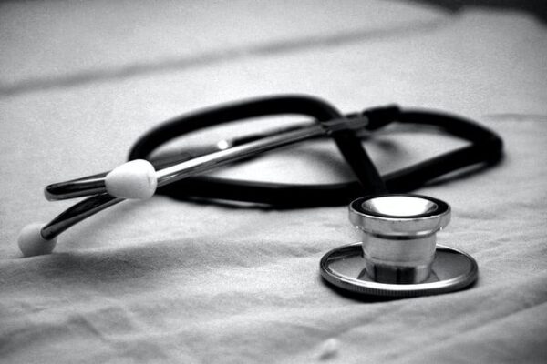 medical stethoscope seen through a black and gray filter