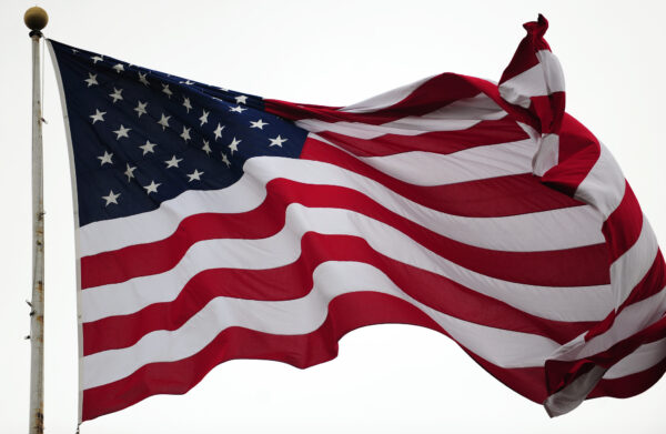 closeup of American flag blowing in the wind