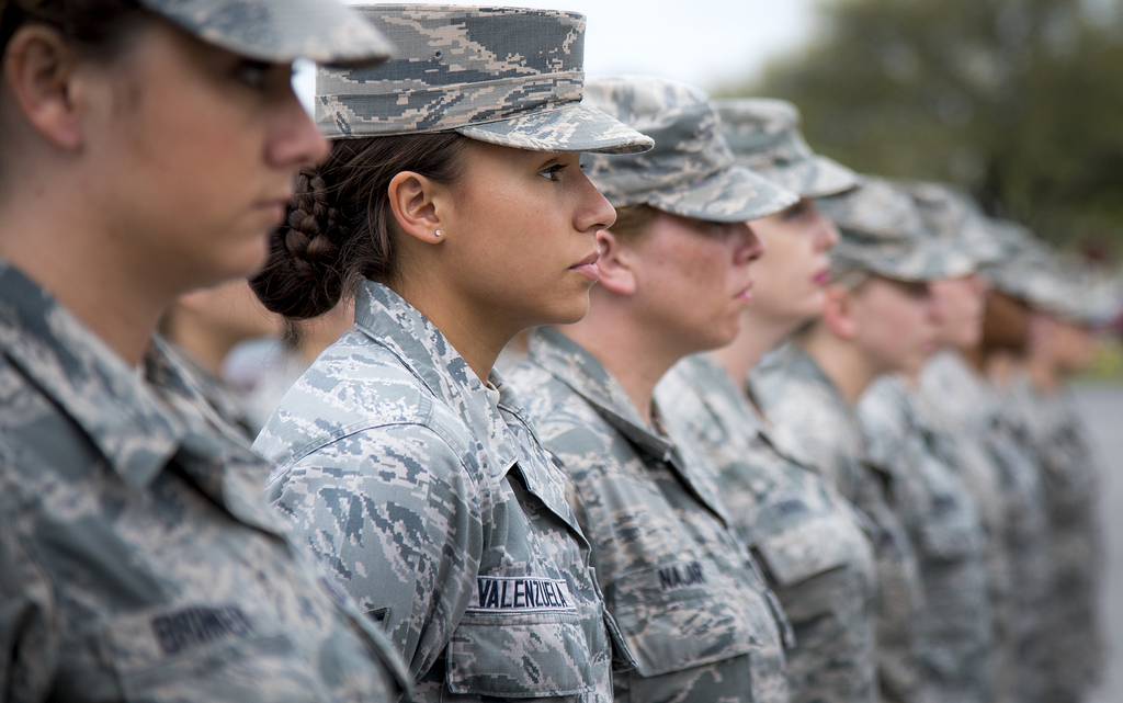 Air Force personnel from the 96th Medical Group stands at parade rest as part of an all-female formation prior to the base retreat ceremony on March 30, 2017, at Eglin Air Force Base in Florida. (Samuel King Jr./Air Force)
