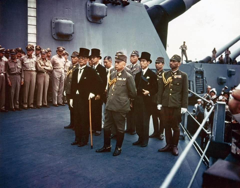 Representatives of the Empire of Japan stand aboard USS Missouri prior to signing of the Instrument of Surrender.