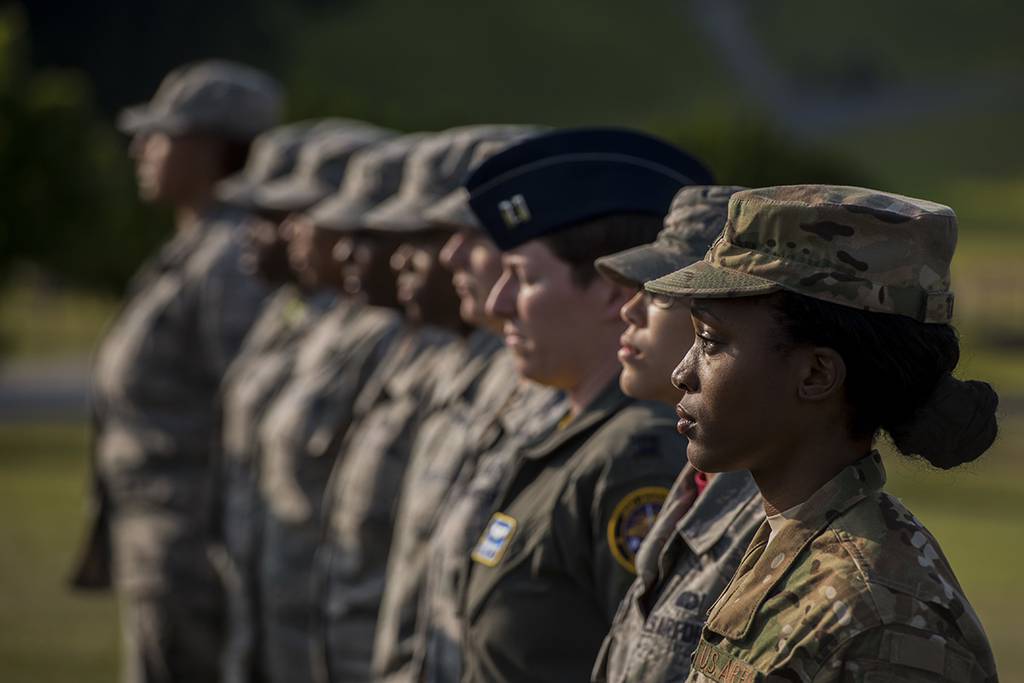 Airmen stand at attention during a retreat ceremony March 30, 2018, on Kadena Air Base, Japan.