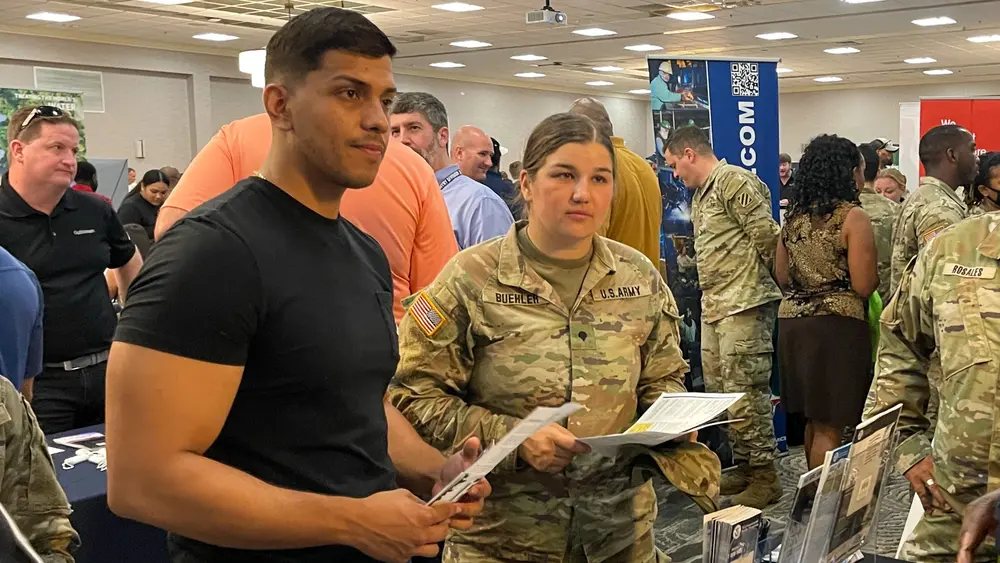 U.S. Army Spc. Sydney Buehler, an Army cannon crewmember with 3rd Infantry Division, attends a national job fair at Fort Stewart, Georgia. The fair was open to transitioning service members, military spouses, veterans, retirees, and their families.Photo by Sgt. Jose Escamilla/U.S. Army

