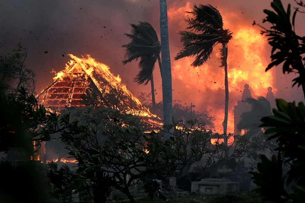 The hall of historic Waiola Church in Lahaina and nearby Lahaina Hongwanji Mission are engulfed in flames along Wainee Street on Tuesday, Aug. 8, 2023, in Lahaina, Hawaii. AP Photo Matthew Thayer