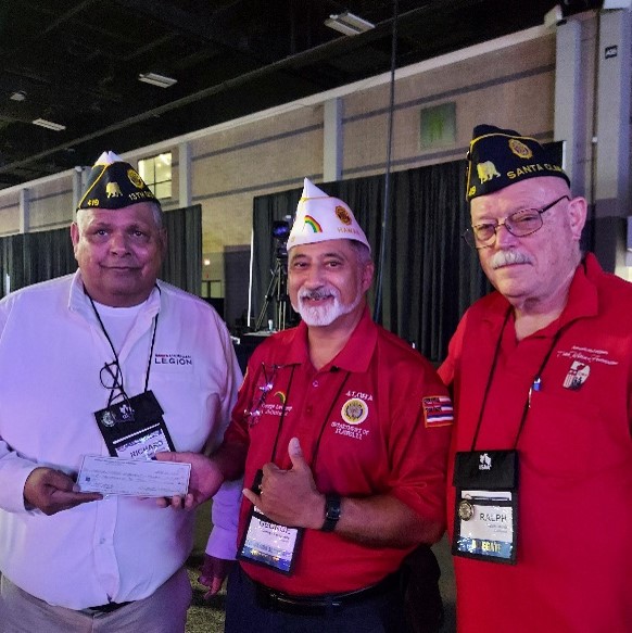 Post 419 Commander Richard Peralez presenting the check to Hawaii Department Adjutant George W LeCampte, with Jr Past Post 419 Commander Ralph Jacob