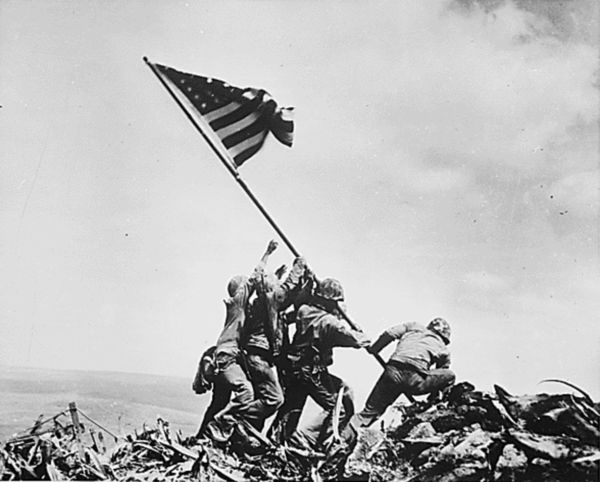 On February 23, 1945, members of the 28th Regiment, 5th Division, United States Marines, raised the American flag on Mount Suribachi in Iwo Jima, Japan