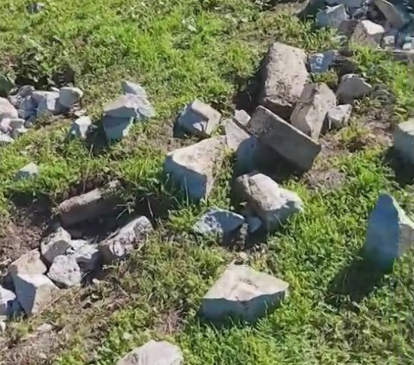 destroyed gravestone