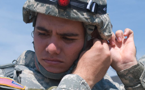 U.S. soldier puts in ear protection