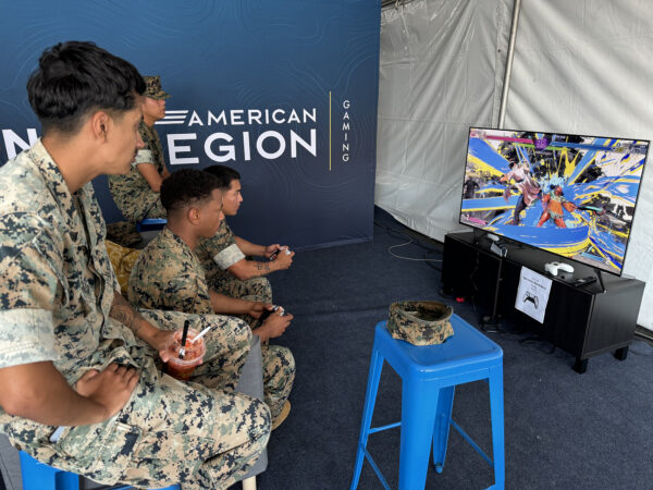 service members playing video games