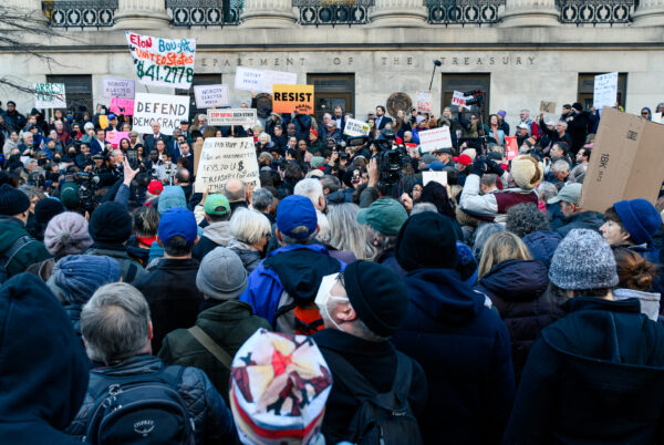 Protesters gather outside the Department of Treasury to oppose DOGE and billionaire Elon Musk on February 4.